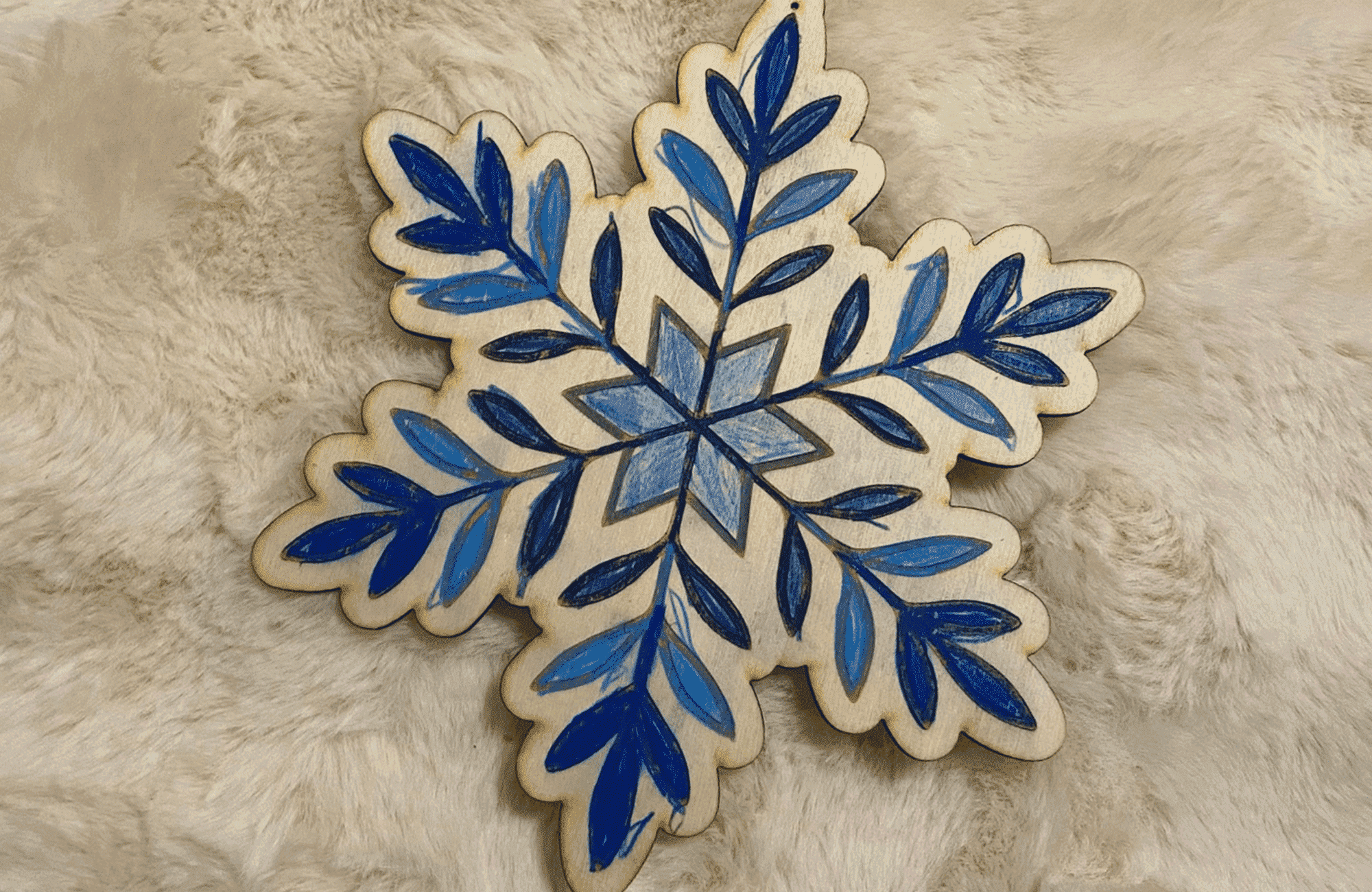 Ausmalbild Schneeflocke aus Holz